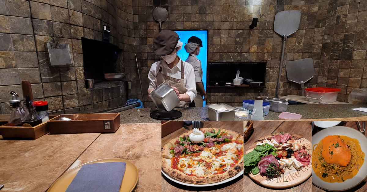 ホーチミンのPizza 4P’sで提供された自家製チーズを使ったピザと料理の盛り合わせ